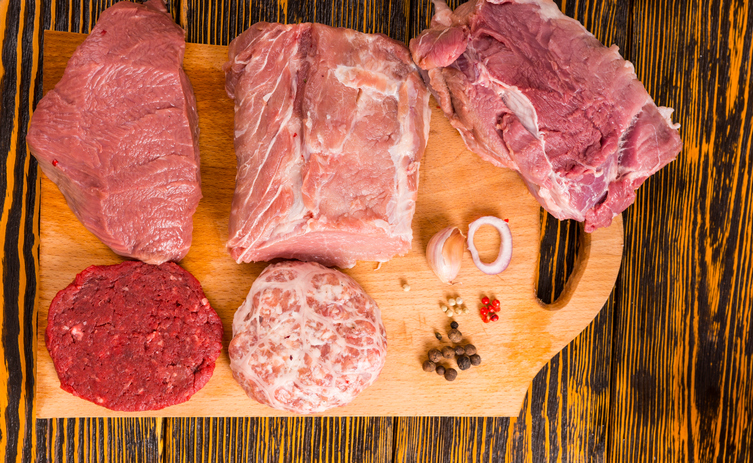 Raw meat on cutting board