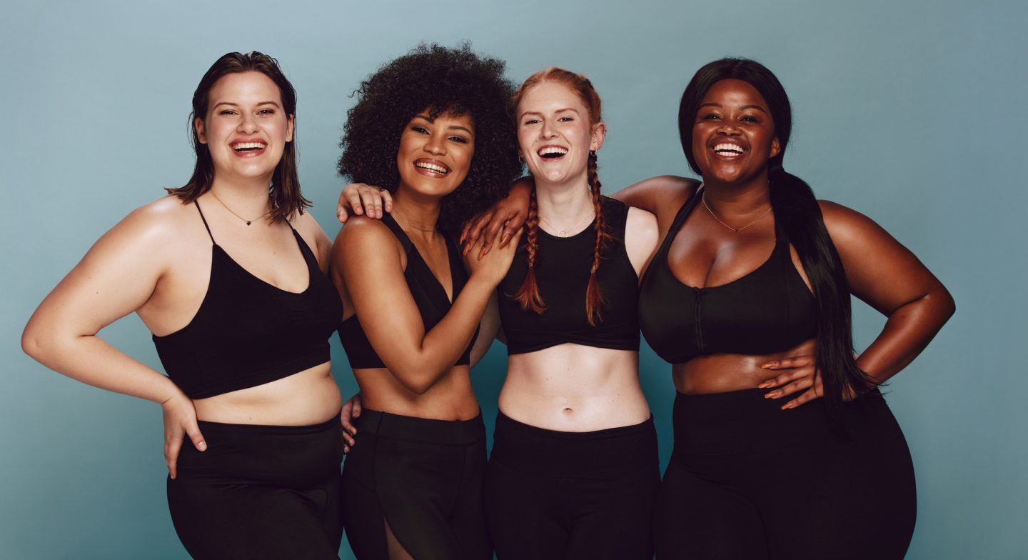 Diverse women embracing their natural bodies